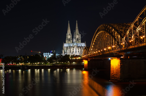 cologne cathedral at night with Hohenzollern bridge