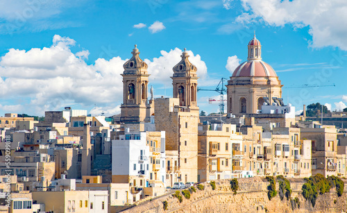 View of Valletta rooftops and Church of Our Lady of Mount Carmel and St. Paul's Anglican Pro-Cathedral, Valletta, capital of Malta 