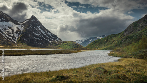 River in mountain landscape at Knutshoe in Jotunheimen National Park in Norway