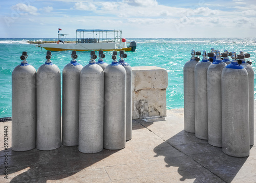 Picture of scuba tanks on a pier, selective focus.