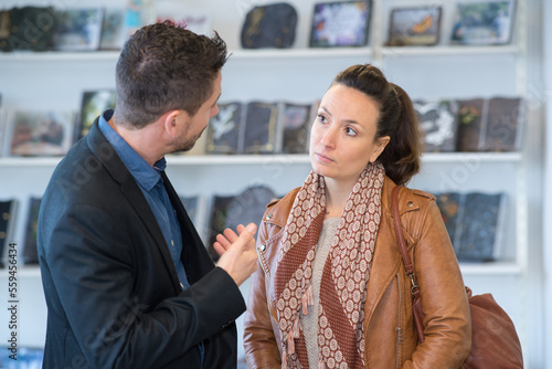 client talking to a mortuary service person