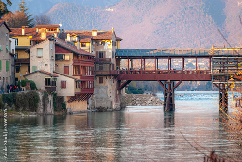 The Ponte Vecchio (Old bridge) is the covered wooden in Bassano del Grappa that spans the river Brenta designed by the architect Andrea Palladio in 1569