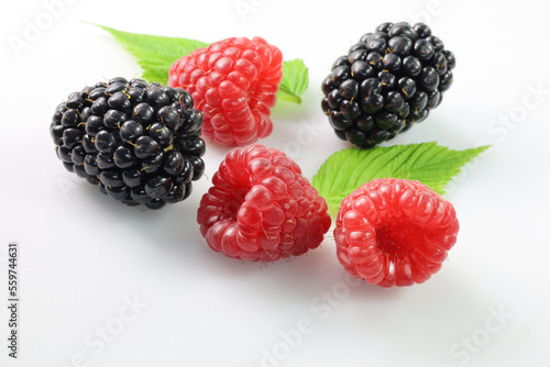 maliny i jeżyny, raspberries and blackberries on a white background