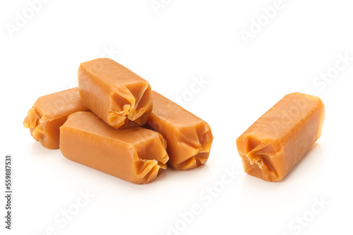 Chewy caramel or toffee candy on white