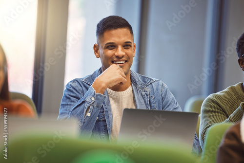 Happy, education and man with a laptop in class, learning scholarship and studying at university. Knowledge, smile and student with a computer at college for research, connection and project