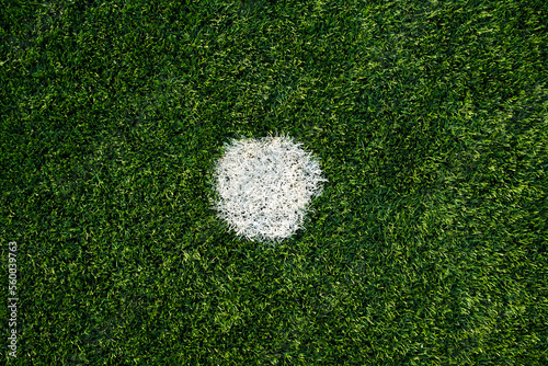 Close up shot of a penalty spot in football pitch