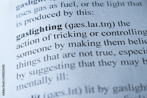 A mock up of a dictionary page with the word gaslighting with selective focussing