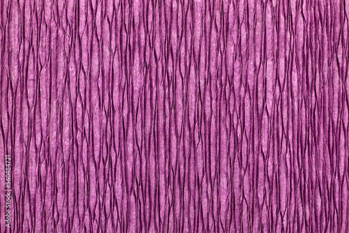 Texture of crepe paper in purple or pink color. Decor paper