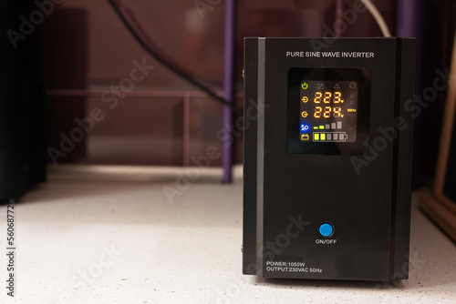 Pure sine wave inverter. Backup Power UPS 1000 W with stabilizer for home.