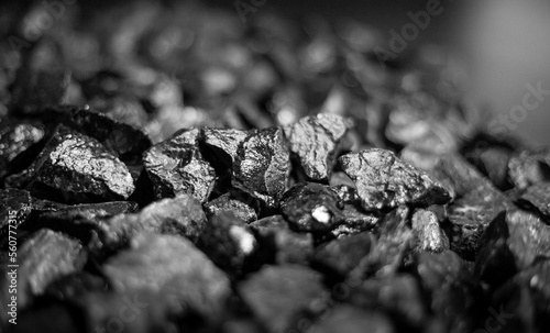 A heap of black natural coal, photo of coal mine background, texture 