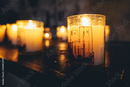 Candles inside the collegiate church of La Romieu in the South of France (Gers)