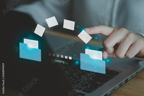 Hand touch on document for Send of document on internet. Data transfer, Transfer file of data between folder, Backup data, Exchange of file on folder, DMS. Virtual document loading to another folder.