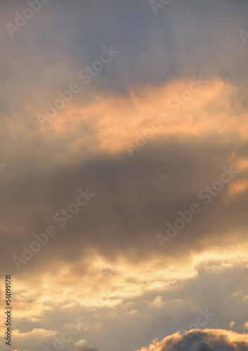 Streaks of orange clouds - vertical photo