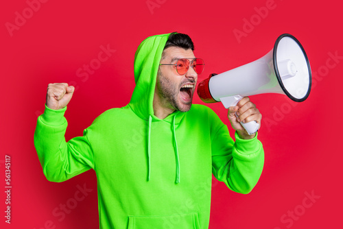 man announcer with loudspeaker in studio. man announcer with loudspeaker shouting.