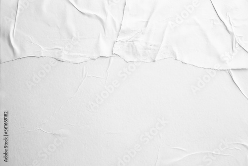 Texture of white torn paper poster, top view. Space for text