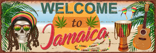 Welcome to Jamaica metal sign with rasta skull,drum, guitar,marijuana, palm tree.