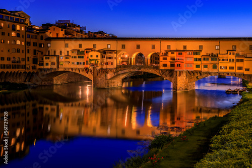 Ponte Vecchio bridge with silversmith shops on Arno at sunset, Florence, Italy