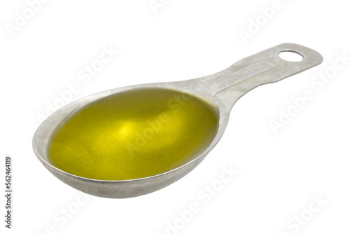 Measuring tablespoon of olive oil on a transparent background