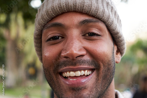 Portrait of multiracial man smiling and looking at camera.