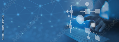 Business process and workflow automation with flowchart, businesswoman in background 