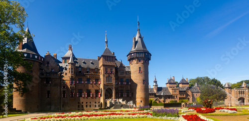 Dutch castle surrounded by garden, De Haar Castle, located in Utrecht, Netherlands.