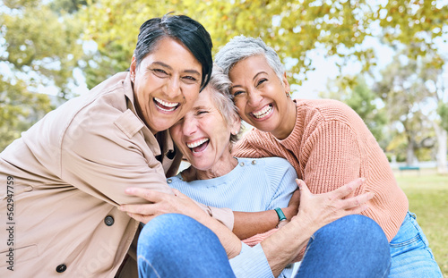 Retirement, women or laughing portrait in funny hug game, comic bonding or silly group activity in relax environment Smile, happy or elderly senior friends in nature park, grass garden or community