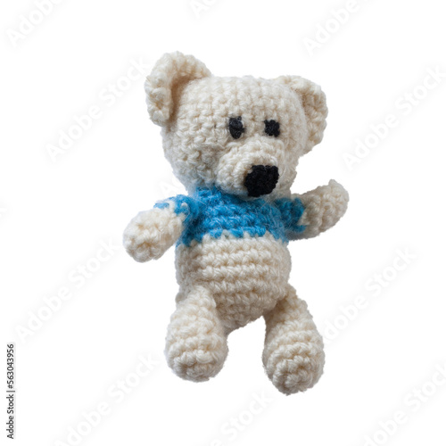 Petit ourson fait au crochet avec du fil blanc et bleu