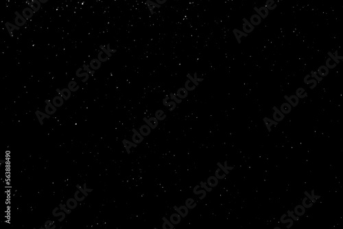 Abstract black background with sparkles and shadows. Fluidity, waves, glitter, fluid, glitter, shimmer. Stars, stardust, space, outer space, comets, placer.