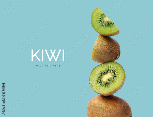Creative layout made of kiwi on the blue background. Flat lay. Food concept. Macro concept.