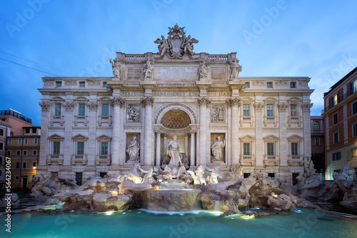 Amazing panoramic view with no people of famous Rome Trevi Fountain (Fontana di Trevi) in blue hour before sunrise, Rome, Italy.