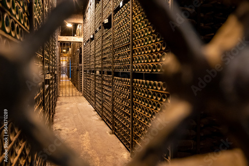 Old bottles of red rioja wine in cellars, wine making in La Rioja region, Spain