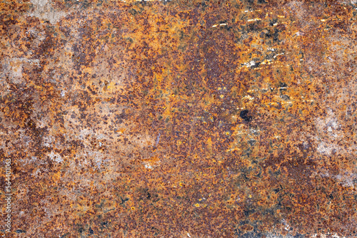 Rusted piece of copper panel grunge background texture