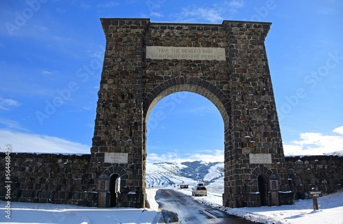  the historic brick roosevelt arch in winter at the north entrance to yellowstone national park near gardiner, montana