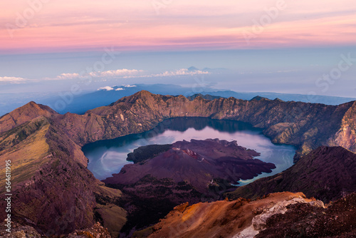 Mount Rinjani. View from the top of the mountain at sunrise. Beatuiful landscape of volcano caldera at Lombok island, Indonesia.