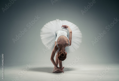 young ballerina girl on a white background
