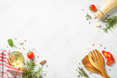 Ingredients for cooking. Food background with herbs and vegetables. Top view on white background.