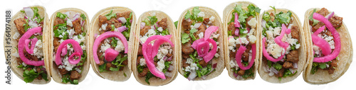 mexican carne asada street tacos with cojita cheese, red pickled onions, in long row shot top down and isolated