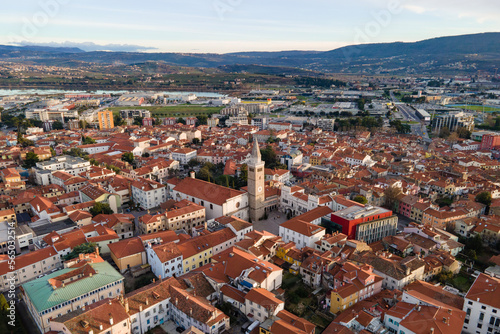 Exciting summer view from flying drone of Koper port. Aerial outdoor scene of Adriatic coastline, Slovenia, Europe. Splendid Mediterranean seascape. Traveling concept background.