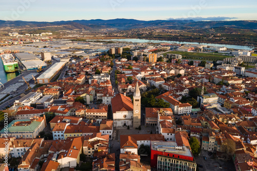 Exciting summer view from flying drone of Koper port. Aerial outdoor scene of Adriatic coastline, Slovenia, Europe. Splendid Mediterranean seascape. Traveling concept background.