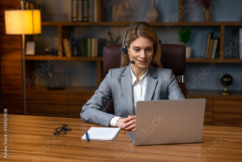 Shot of beautiful young business woman making video call with co