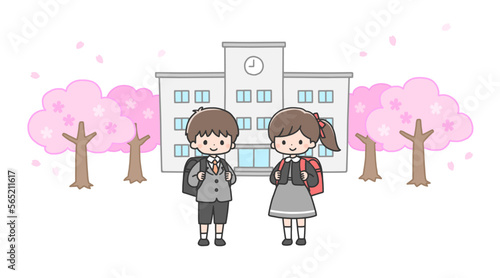 入学式 校舎の前に立つ新一年生の男の子と女の子