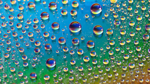 Water drops. Abstract gradient background. Texture of the drops. Iridescent gradient. Heavily textured image. Shallow depth of field. Selective focus
