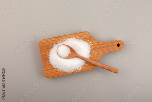 Erythritol, also called melon sugar on wooden board. Very popular sweetener. Food additive E968, sugar substitute. Fructose, Alternative sweetness, zero calorie