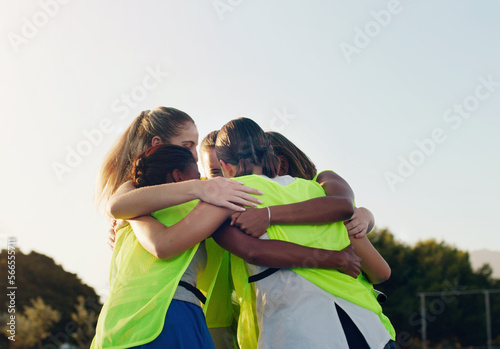Support, hug and team huddling for hockey, game motivation and sports on a field in Australia. Team building, planning and athlete girls with a circle huddle for teamwork, training and sport