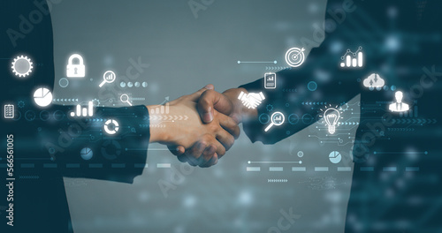 Business and Technology. Businessman and Businesswoman shake hands blurred background, white digital and interface icon. 