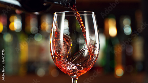 Detail of pouring red wine into glass.