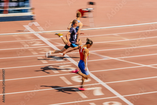 rivalry at finish line sprint race motion blur