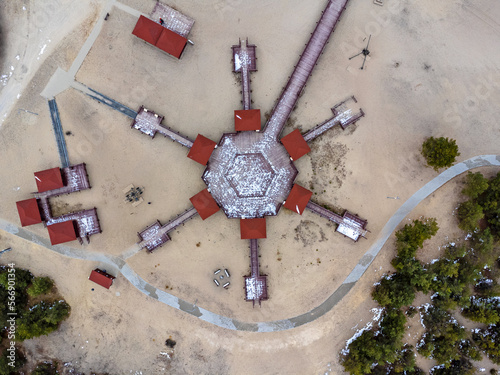 Aerial view landscape. Wind rose, vagrant desert, trees and sand, object , building.