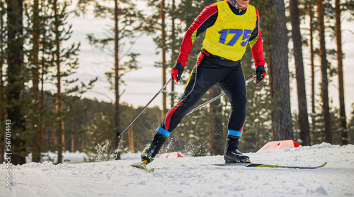 male skier running cross-country skiing