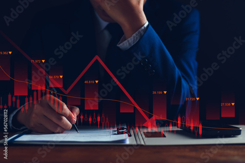 Property values ​​are steadily declining. Unhappy businessman, business downturn. company stocks fall in value, economic crisis, global economy slows down, trading drops, high risk investments.